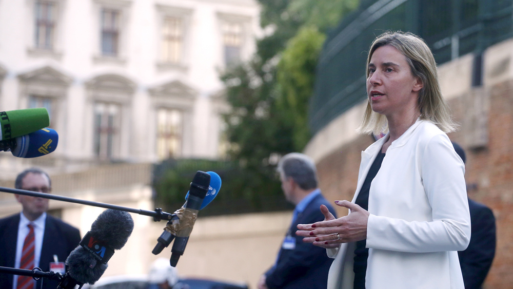 European Union foreign policy chief Federica Mogherini talks to reporters outside the Palais Coburg hotel where the Iran nuclear talks meetings are being held in Vienna, Austria June 28, 2015. The six nations seeking to negotiate a long-term agreement with Iran to curb the most sensitive parts of its nuclear programme plan to continue negotiating beyond Tuesday's deadline, a senior U.S. official said. REUTERS/Carlos Barria - RTX1I5IX